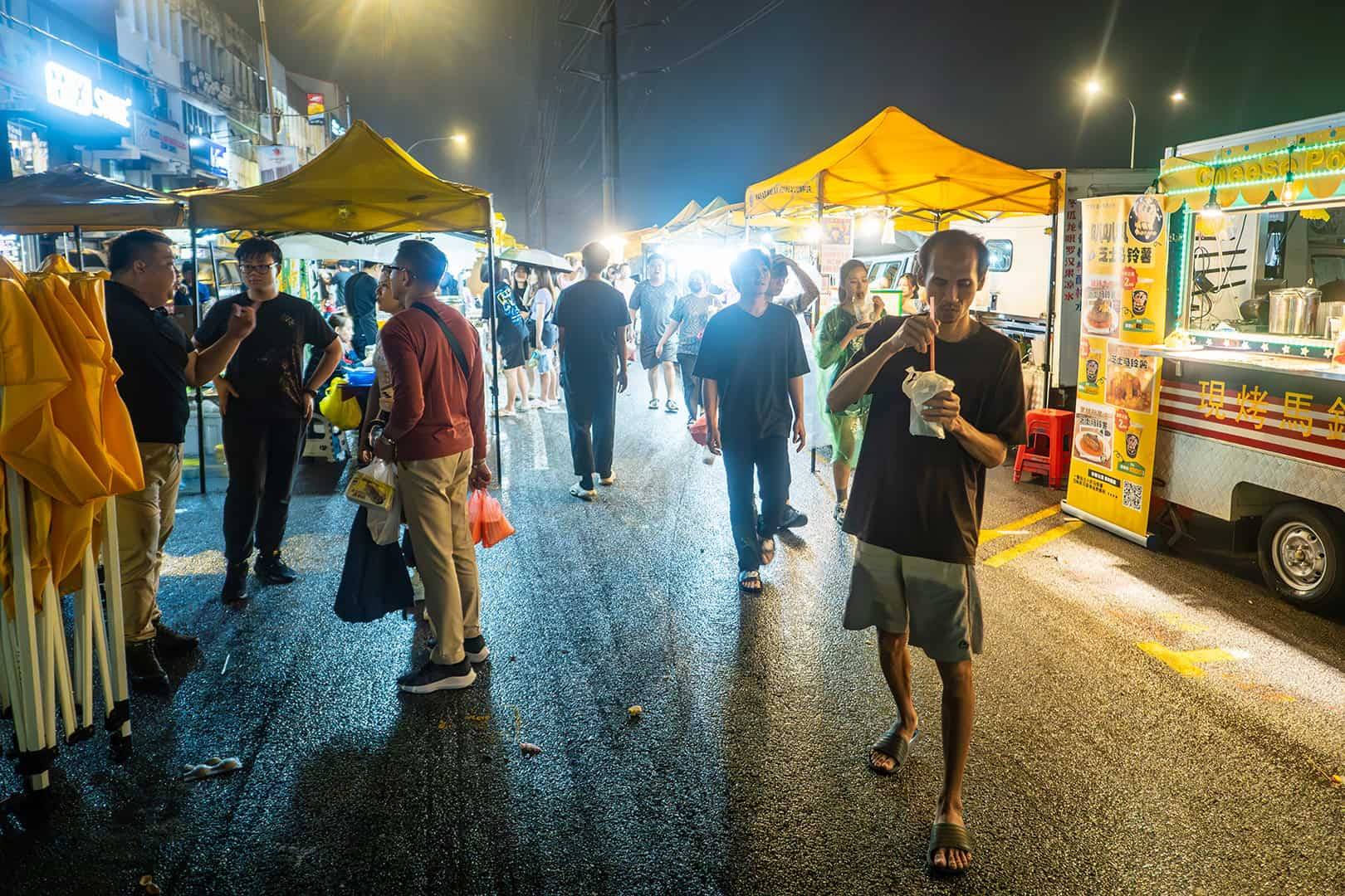 Food stalls and visitors at Taman Connaught Night Market